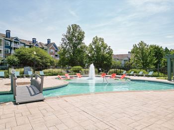 Commmons pool with chairs and water fountain
